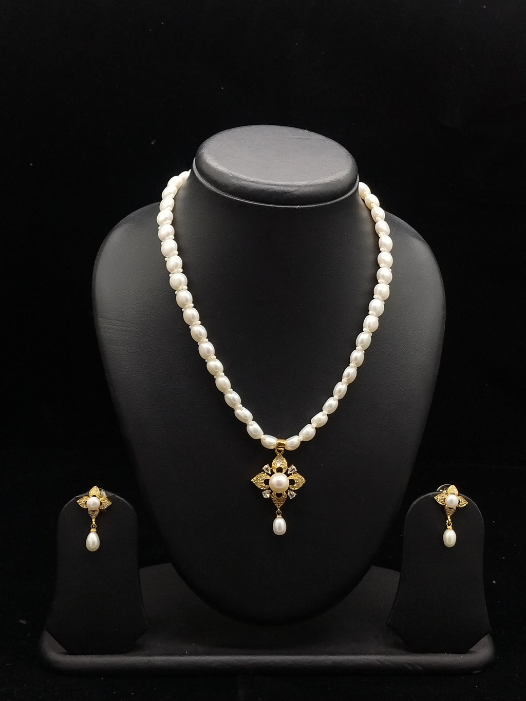 Handcrafted Button Pearl Strand with CZ Floral Pendant