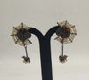 sacred bull temple oxidized silver earrings with pearl clusters and red stone accents