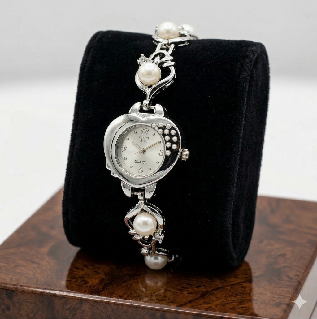 silver tone pearl designer bracelet watch for women with pearl accents