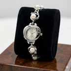 silver tone pearl designer bracelet watch for women with pearl accents