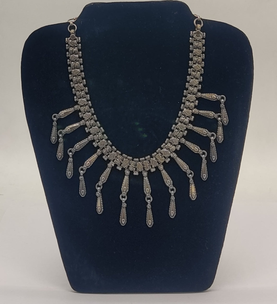 tribal fringe oxidized silver necklace with teardrop embossed danglers
