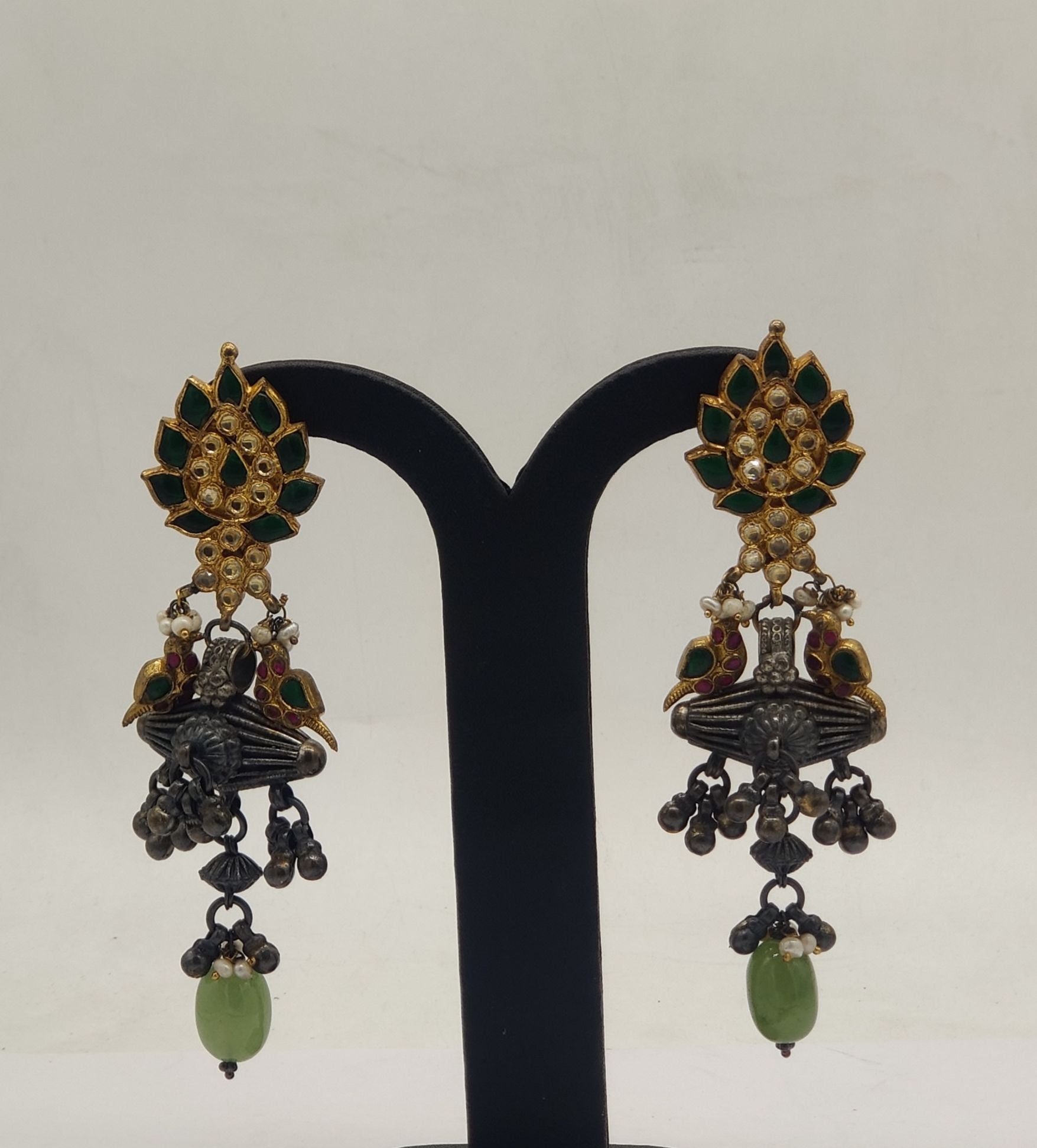 vrindavan bird oxidized silver chandelier earrings with green stones pearls and bead drops